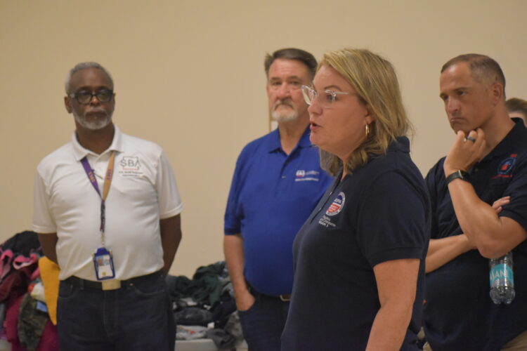 Federal Officials Tour Flood-Torn Neighborhoods